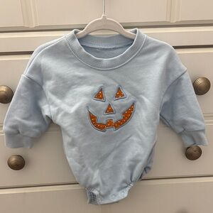 Light Blue Pumpkin Face Baby Onesie
